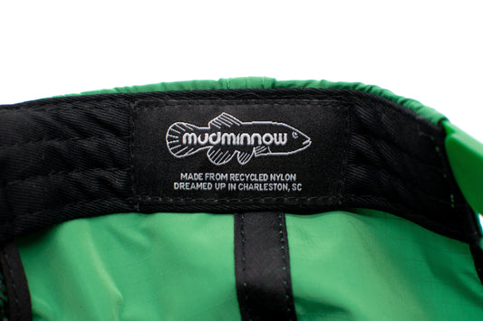 Why Mudminnow Chooses Recycled Nylon for Snapback Hats